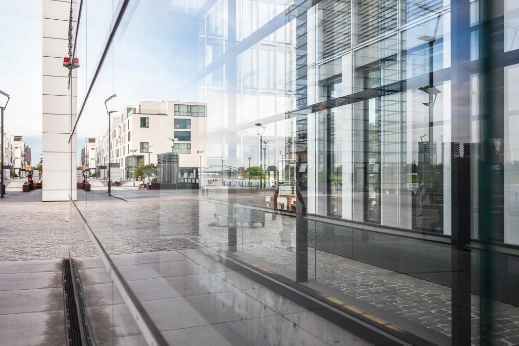 view of a modern office exterior with sunlight bea